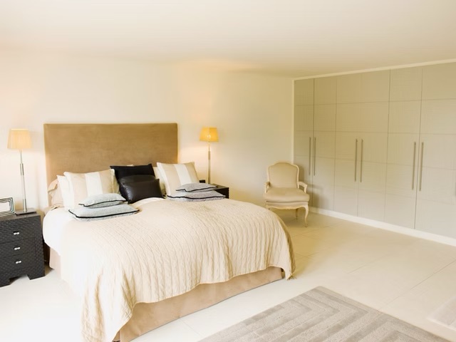 A renovated bedroom in a home renovation project